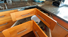 Corner drawers were custom made by Gillingham Cabinets, along with all the other kitchen and bathroom cabinets and built-ins. Photograph by: Debra Brash