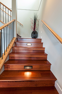 Extra wide stairs with inset lights are a beautiful addition for the owners, and for aging parents who visit frequently from Calgary. Photograph by: Debra Brash